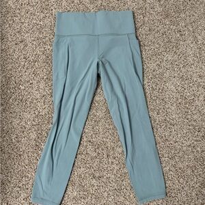 Athleta Salutation Stash Pocket 7/8 Tight